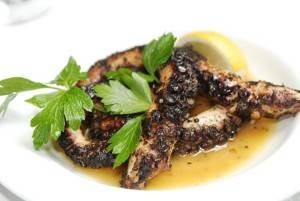 Grilled octopus on the charcoals